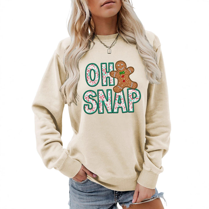 Kvinnors sweatshirt med roligt pepparkakeman motiv och glittrande bokstäver Mirla-Eva Jonsson