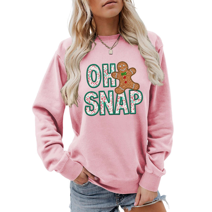 Kvinnors sweatshirt med roligt pepparkakeman motiv och glittrande bokstäver Mirla-Eva Jonsson