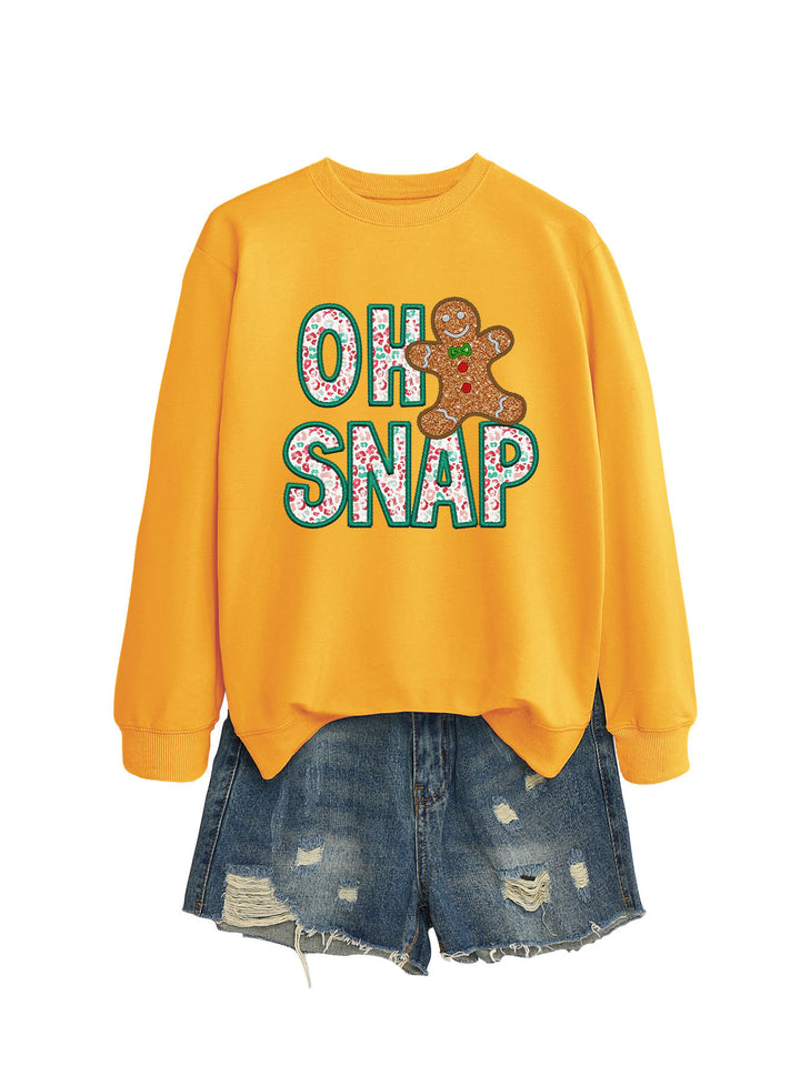 Kvinnors sweatshirt med roligt pepparkakeman motiv och glittrande bokstäver Mirla-Eva Jonsson