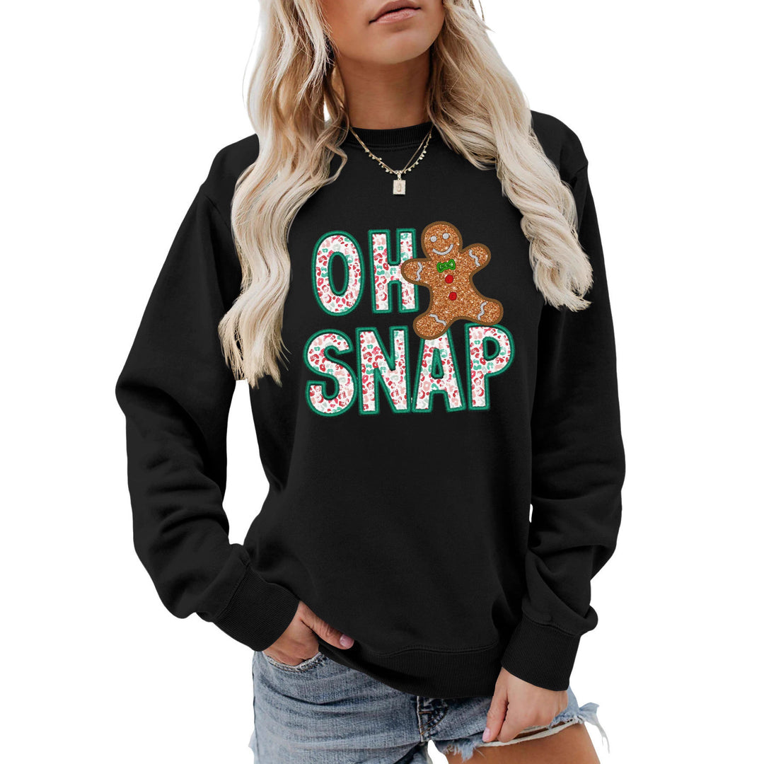 Kvinnors sweatshirt med roligt pepparkakeman motiv och glittrande bokstäver Mirla-Eva Jonsson