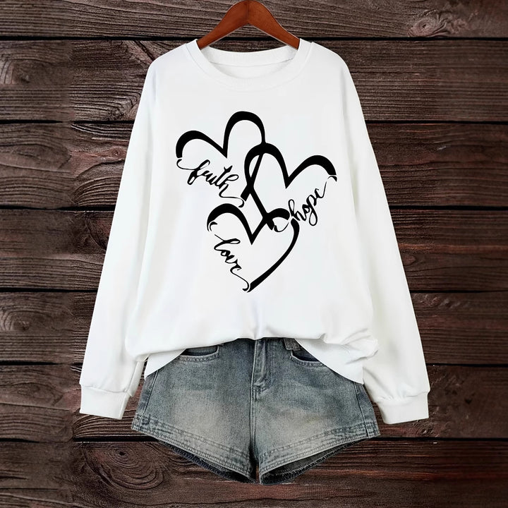 Kvinnors sweatshirt med romantiskt hjärtmotiv och inspirerande tryck Mirla-Eva Jonsson