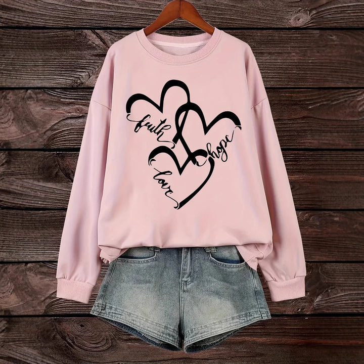Kvinnors sweatshirt med romantiskt hjärtmotiv och inspirerande tryck Mirla-Eva Jonsson