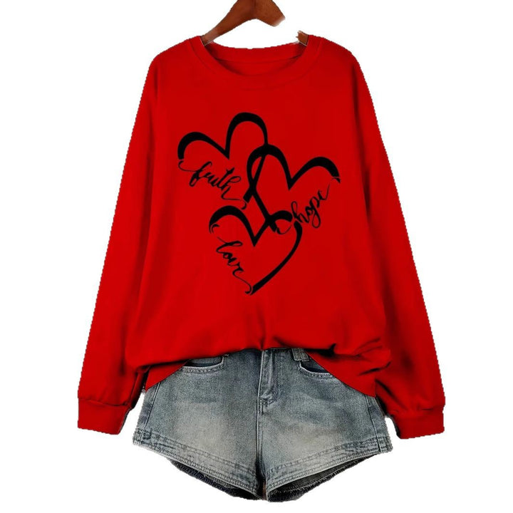 Kvinnors sweatshirt med romantiskt hjärtmotiv och inspirerande tryck Mirla-Eva Jonsson