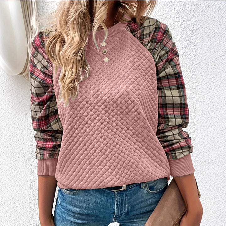 Kvinnors sweatshirt med rutstruktur och rutiga ärmar Mirla-Eva Jonsson
