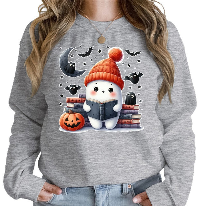 Kvinnors sweatshirt med sött Halloween-motiv och bokdesign Mirla-Eva Jonsson
