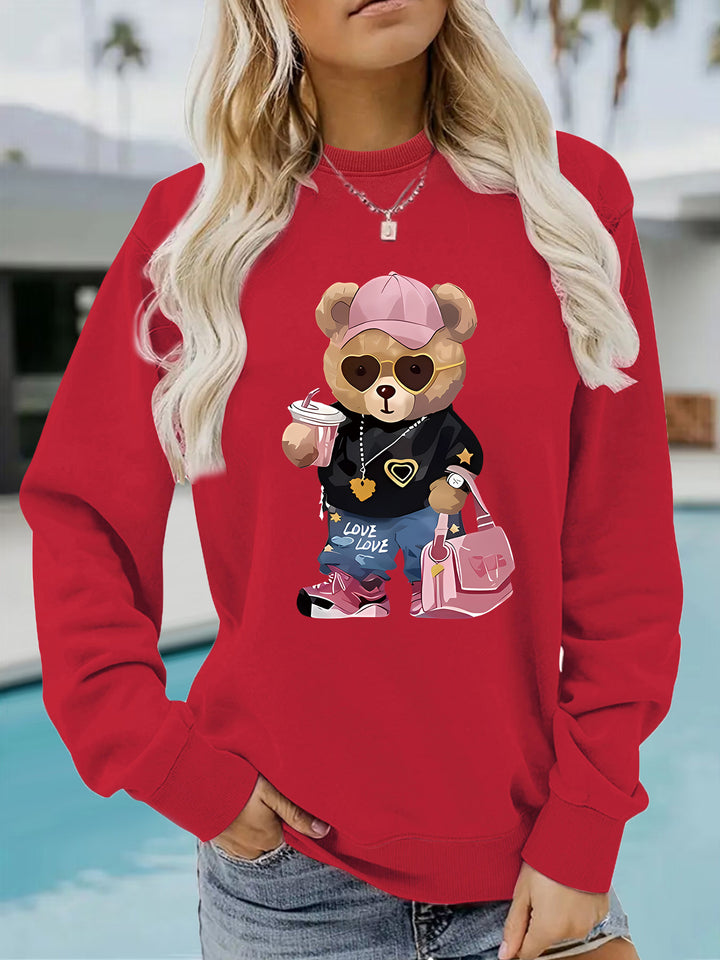 Kvinnors sweatshirt med unikt tecknad björn design och trendig text Mirla-Eva Jonsson