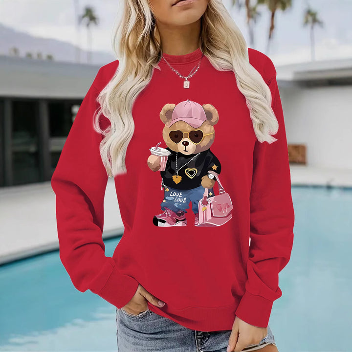 Kvinnors sweatshirt med unikt tecknad björn design och trendig text Mirla-Eva Jonsson