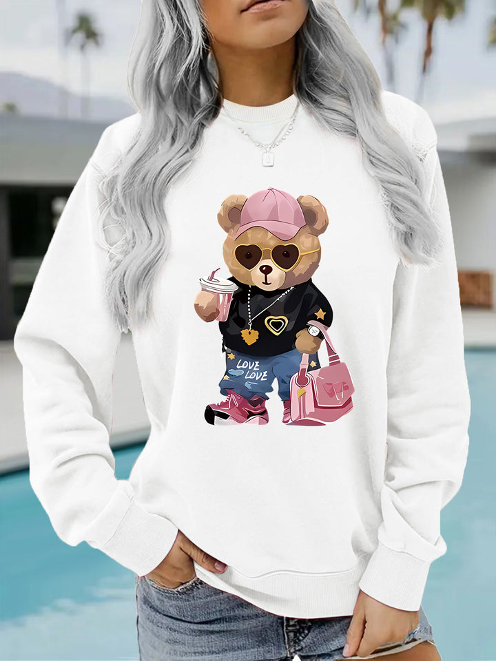 Kvinnors sweatshirt med unikt tecknad björn design och trendig text Mirla-Eva Jonsson