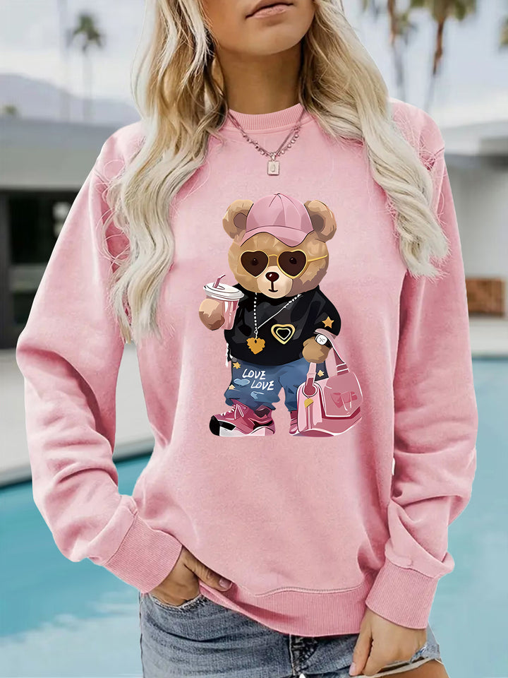 Kvinnors sweatshirt med unikt tecknad björn design och trendig text Mirla-Eva Jonsson