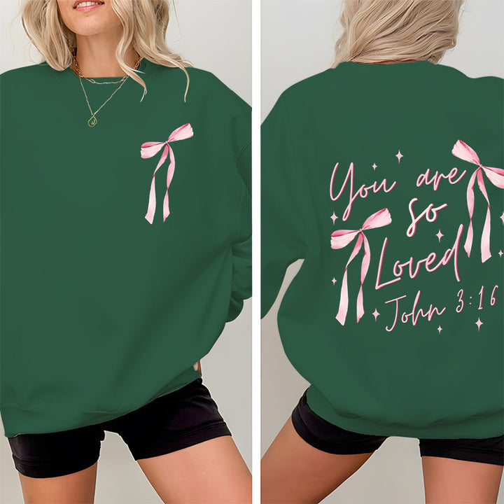 Kvinnors sweatshirt med unikt tryck och lekfull design Mirla-Eva Jonsson