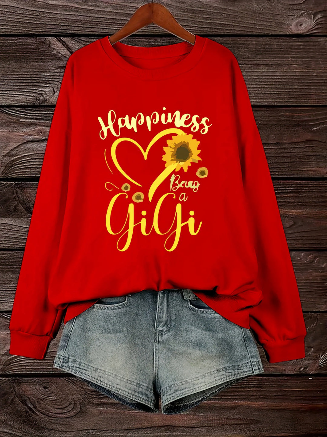 Kvinnors sweatshirt med voluminösa ärmar och glad motiv Mirla-Eva Jonsson