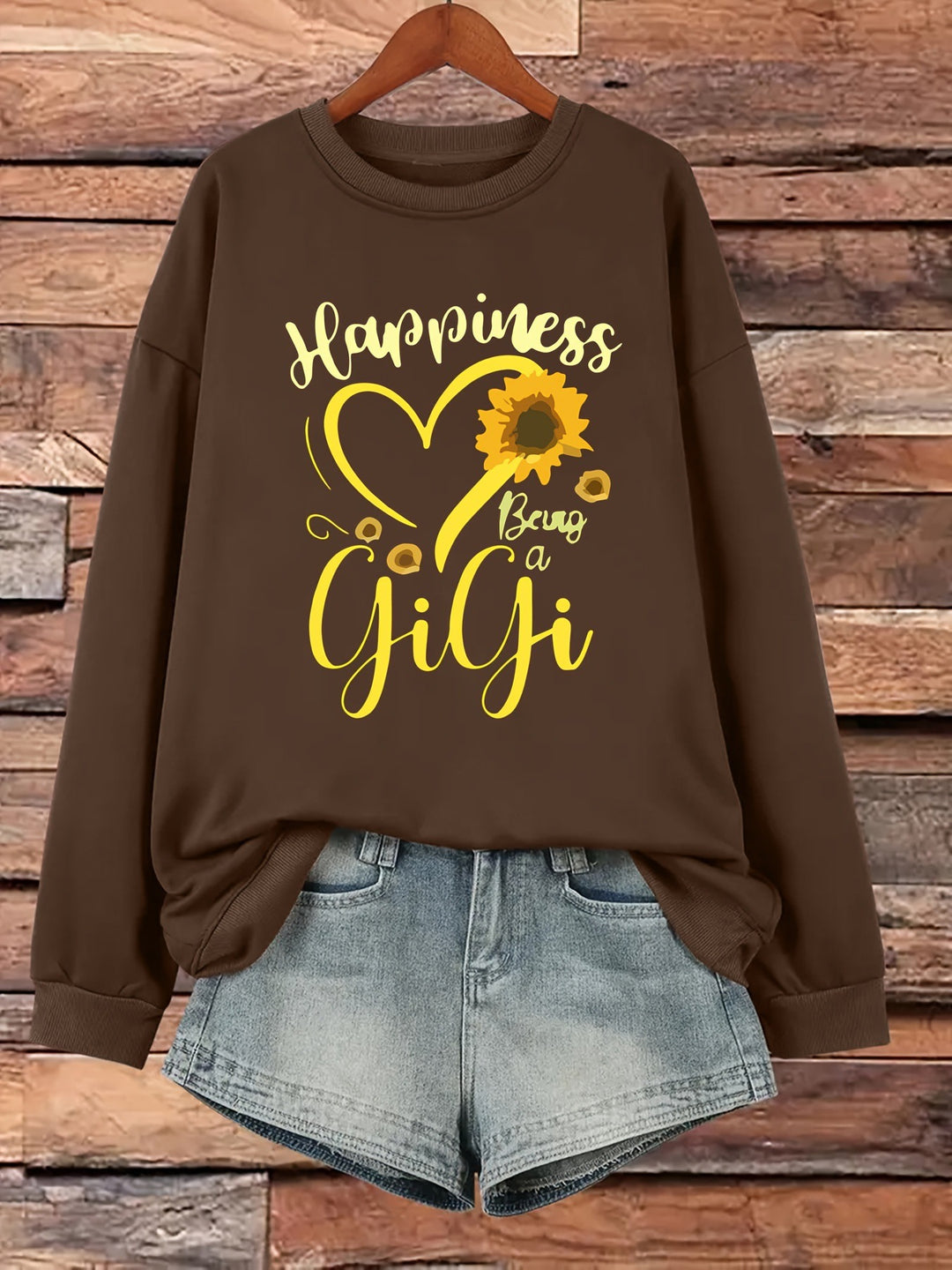 Kvinnors sweatshirt med voluminösa ärmar och glad motiv Mirla-Eva Jonsson