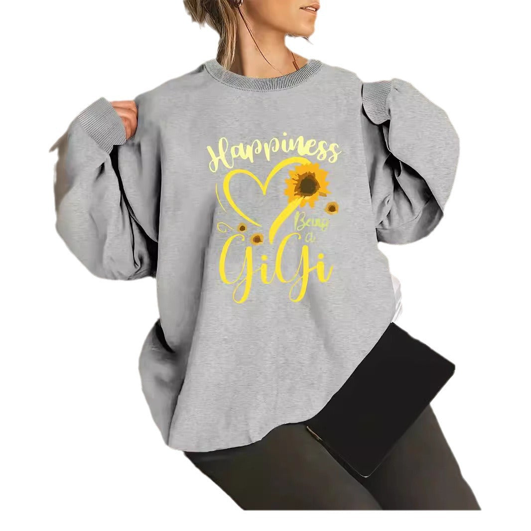 Kvinnors sweatshirt med voluminösa ärmar och glad motiv Mirla-Eva Jonsson
