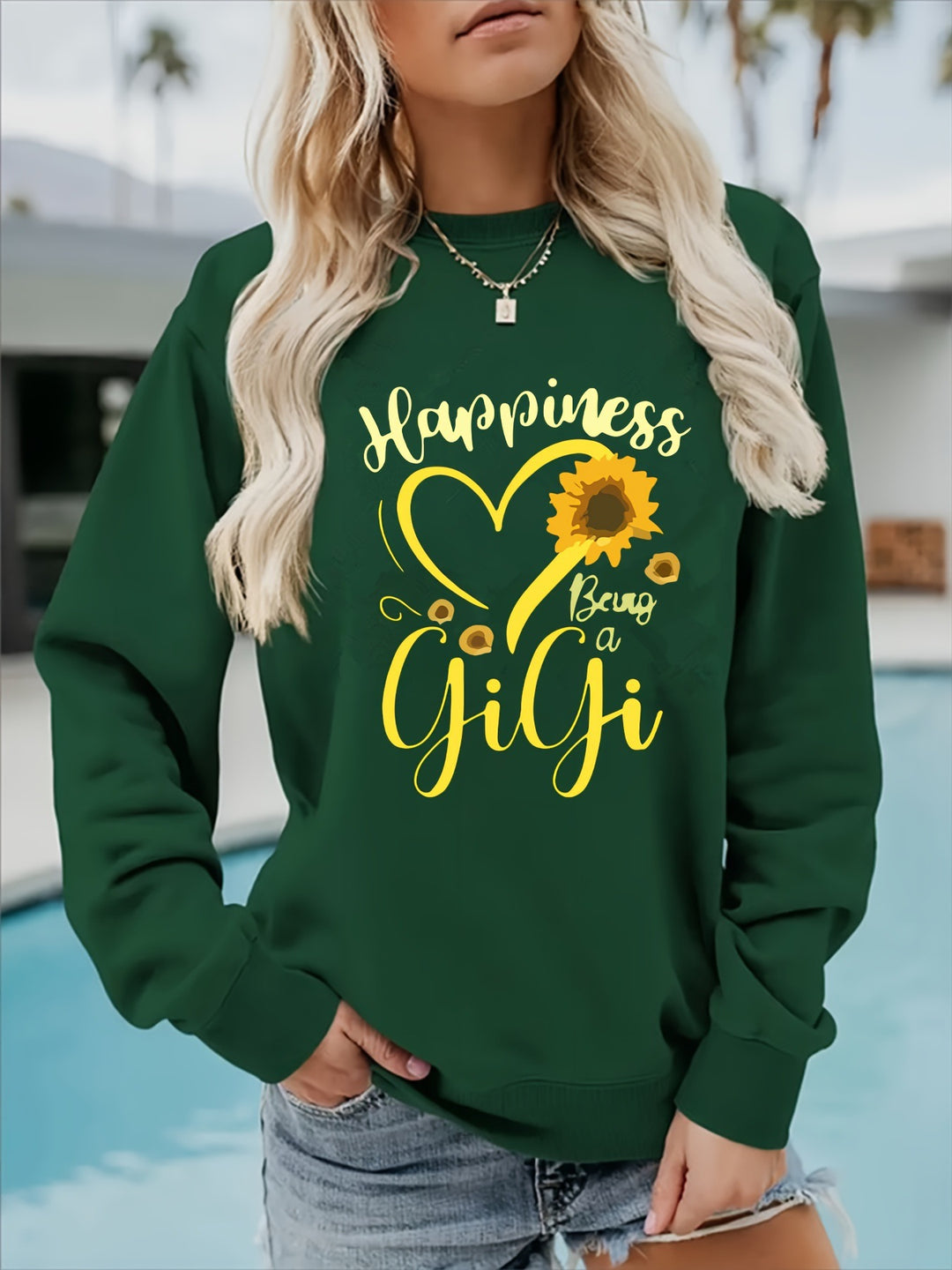Kvinnors sweatshirt med voluminösa ärmar och glad motiv Mirla-Eva Jonsson