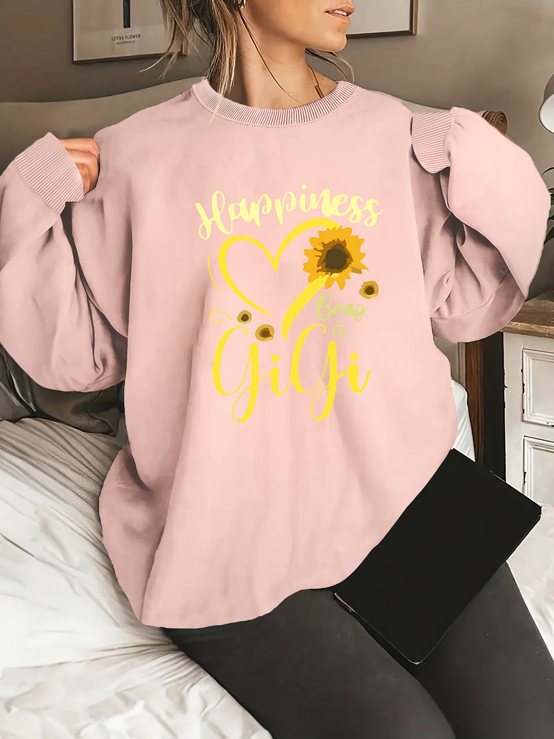 Kvinnors sweatshirt med voluminösa ärmar och glad motiv Mirla-Eva Jonsson