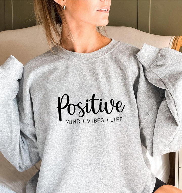 Kvinnors sweatshirt med voluminösa ärmar och inspirerande tryck Mirla-Eva Jonsson