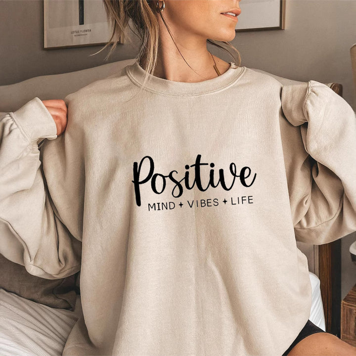 Kvinnors sweatshirt med voluminösa ärmar och inspirerande tryck Mirla-Eva Jonsson