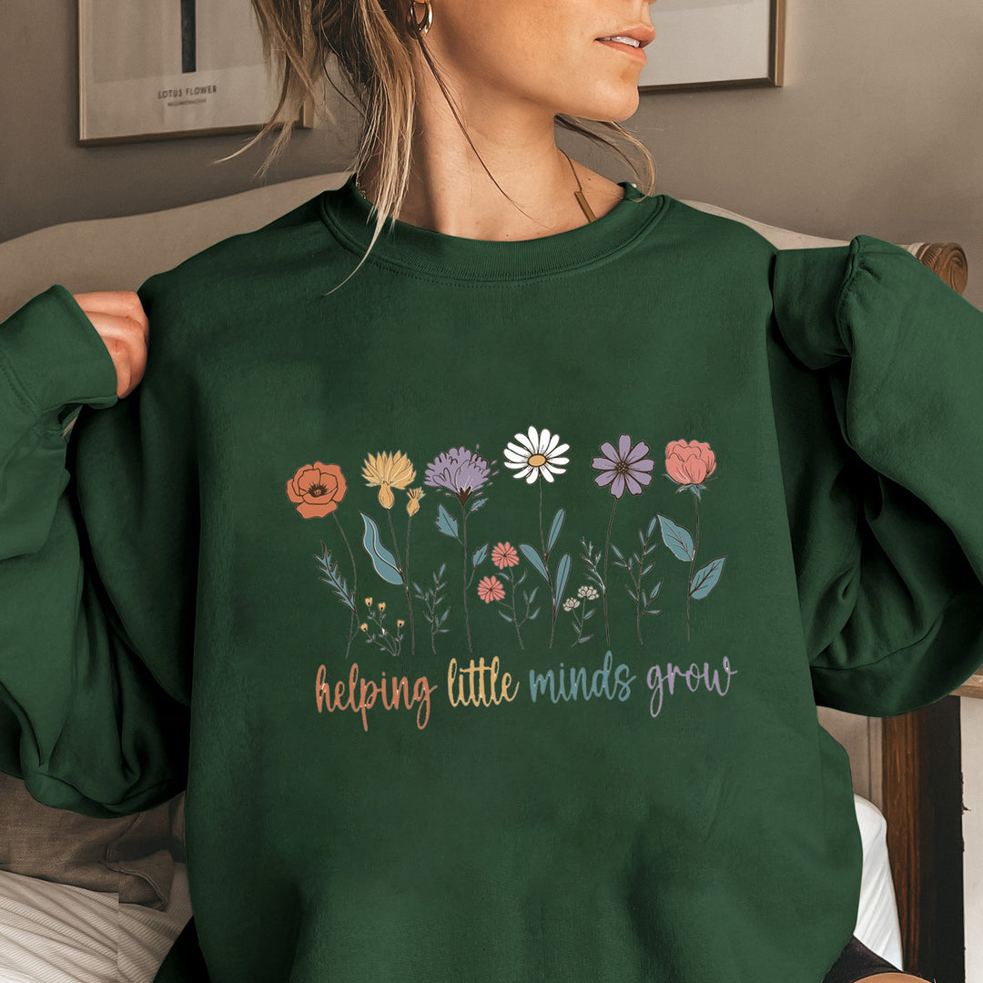 Kvinnors sweatshirt med voluminösa ärmar och motiverande blommönster Mirla-Eva Jonsson