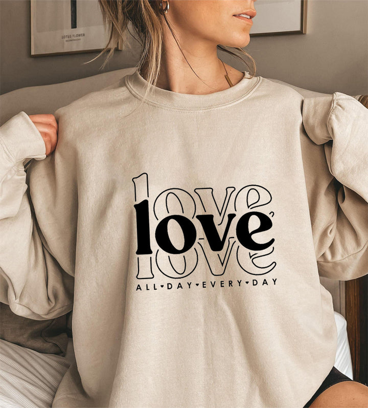 Kvinnors sweatshirts med voluminösa ärmar och modern kärlekstryck Mirla-Eva Jonsson