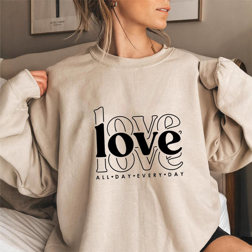 Kvinnors sweatshirts med voluminösa ärmar och modern kärlekstryck Mirla-Eva Jonsson