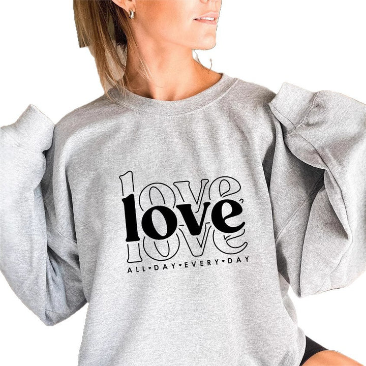 Kvinnors sweatshirts med voluminösa ärmar och modern kärlekstryck Mirla-Eva Jonsson