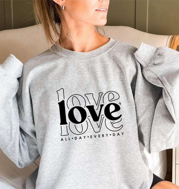 Kvinnors sweatshirts med voluminösa ärmar och modern kärlekstryck Mirla-Eva Jonsson