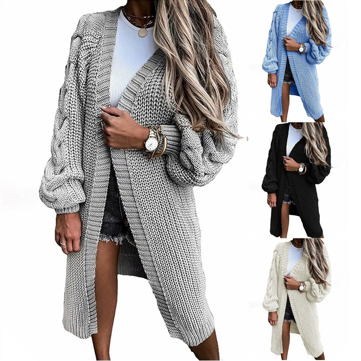 Kvinnors tjocka stickade cardigan med voluminösa ärmar och öppen front Mirla-Eva Jonsson