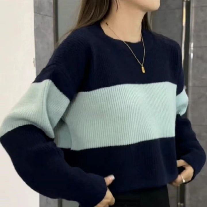 Kvinnors tjocka stickade tröja med modern färgblockdesign Mirla-Eva Jonsson
