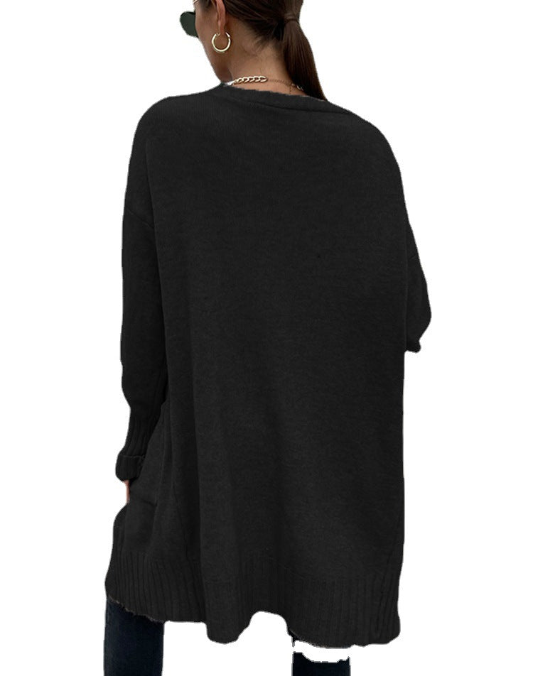 Kvinnors tjockstickad cardigan med djupa fickor och avslappnad design Mirla-Eva Jonsson