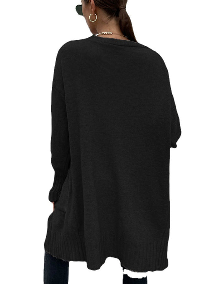 Kvinnors tjockstickad cardigan med djupa fickor och avslappnad design Mirla-Eva Jonsson