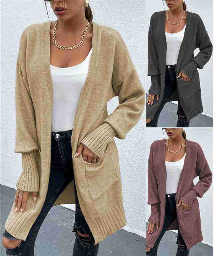 Kvinnors tjockstickad cardigan med djupa fickor och avslappnad design Mirla-Eva Jonsson