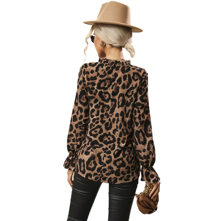 Kvinnors topp med leopardmönster och voluminösa ärmar Mirla-Eva Jonsson
