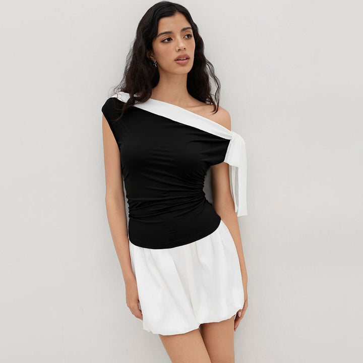 Kvinnors topp med off-shoulder design och lekfull knytning stängning Mirla-Eva Jonsson