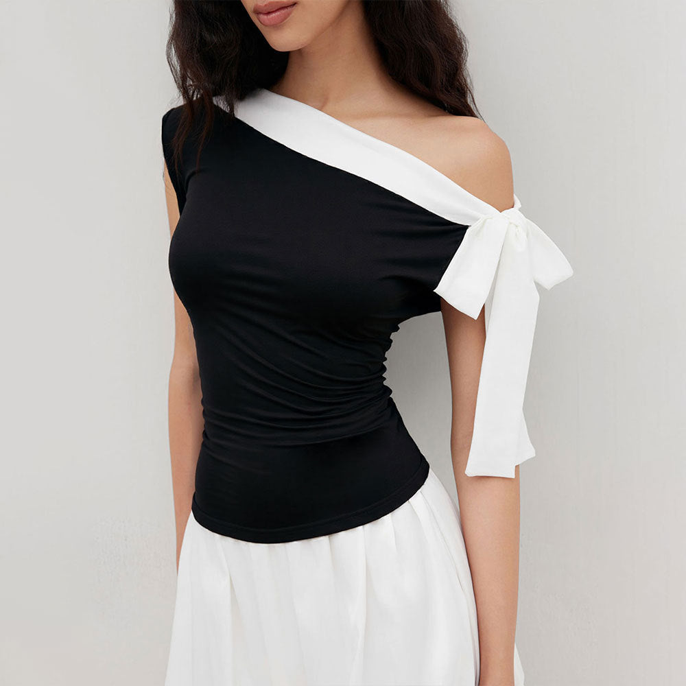 Kvinnors topp med off-shoulder design och lekfull knytning stängning Mirla-Eva Jonsson