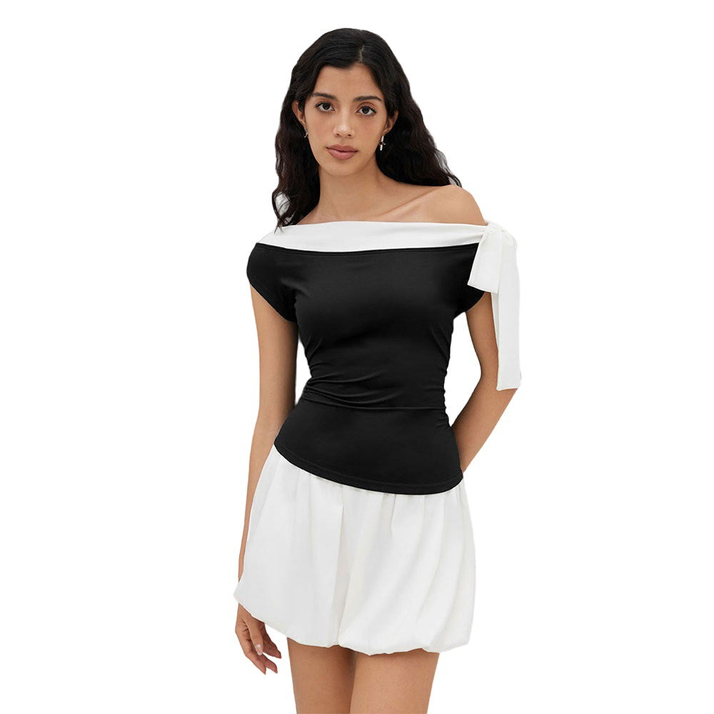 Kvinnors topp med off-shoulder design och lekfull knytning stängning Mirla-Eva Jonsson