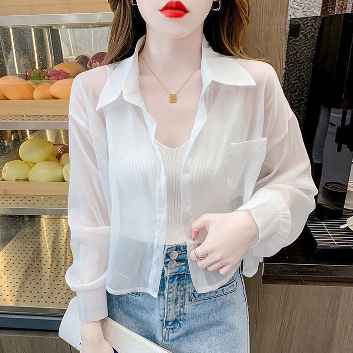Kvinnors transparent blus med delikat V-halsning och fina ribb detaljer Mirla-Eva Jonsson