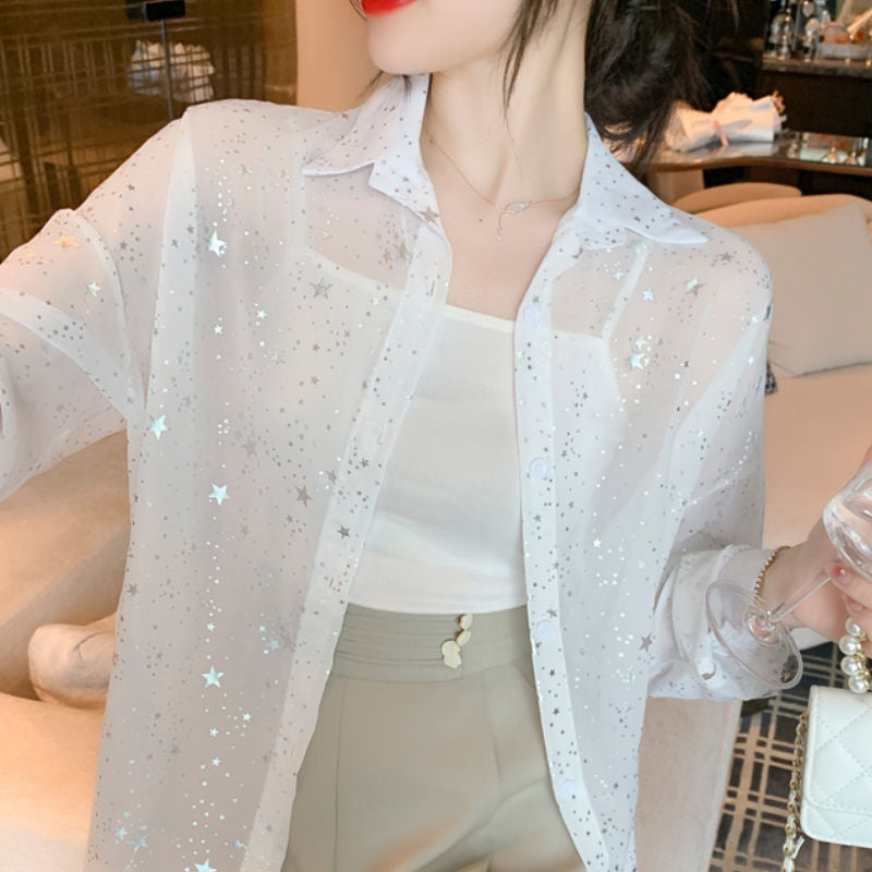 Kvinnors transparent blus med gnistrande stjärnor Mirla-Eva Jonsson