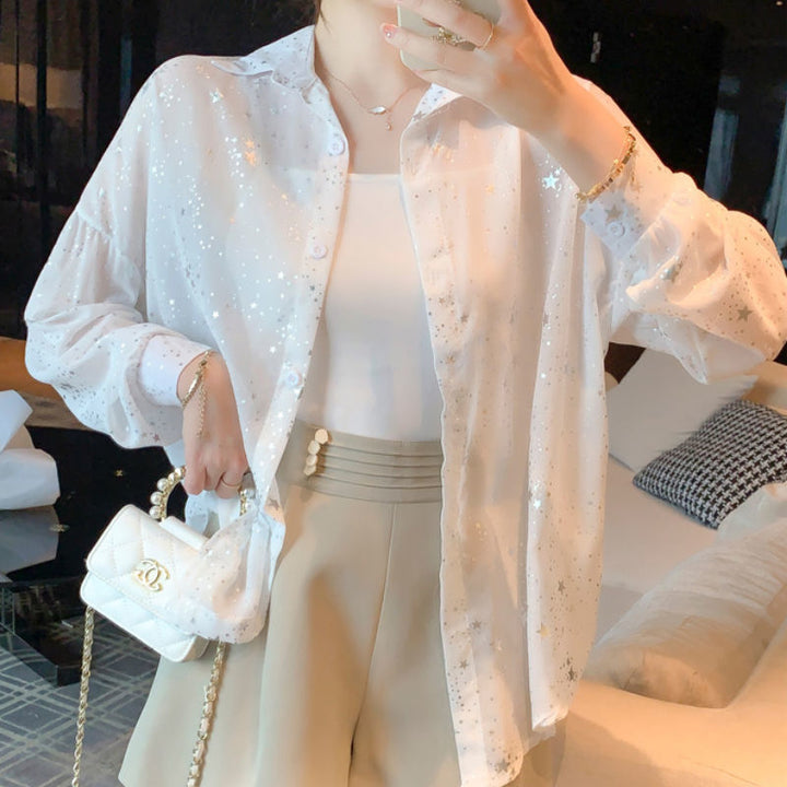 Kvinnors transparent blus med gnistrande stjärnor Mirla-Eva Jonsson