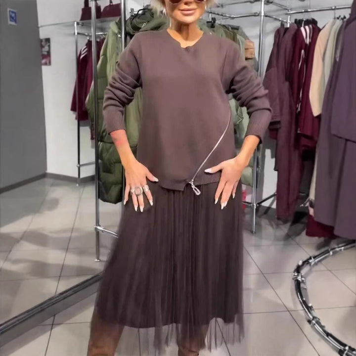Kvinnors trendiga, asymmetriska tröja med drapering Mirla-Eva Jonsson