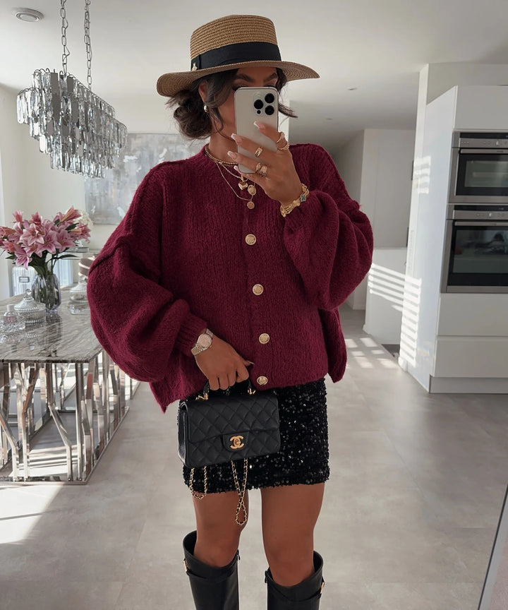 Kvinnors trendiga cardigan med oversized ärmar och knapprad Mirla-Eva Jonsson