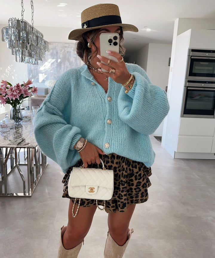 Kvinnors trendiga cardigan med oversized ärmar och knapprad Mirla-Eva Jonsson
