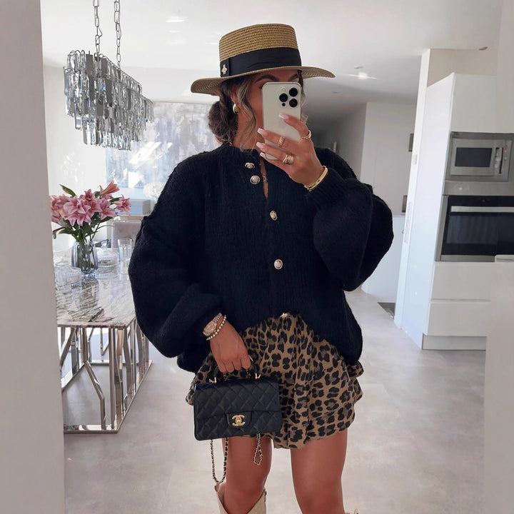 Kvinnors trendiga cardigan med oversized ärmar och knapprad Mirla-Eva Jonsson