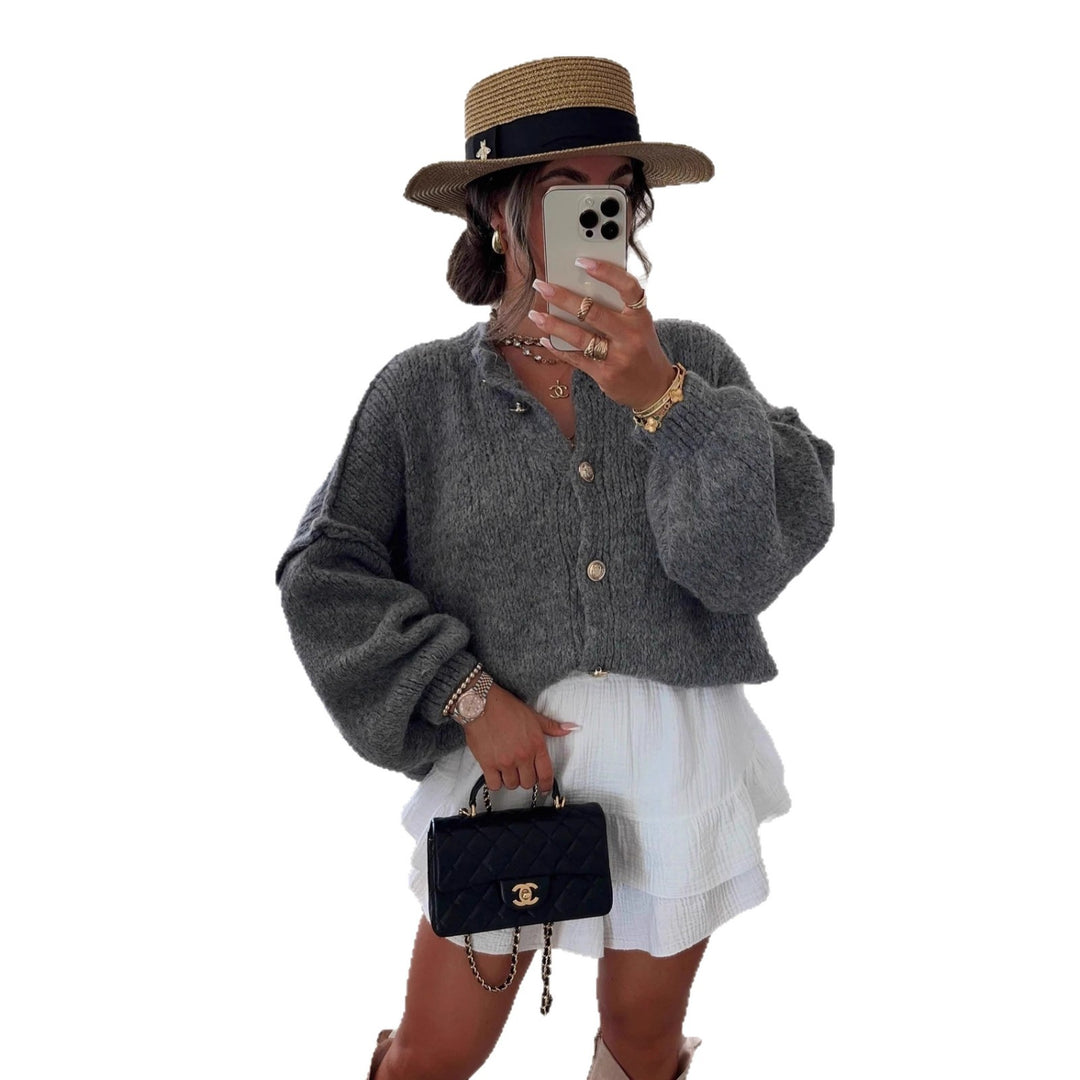 Kvinnors trendiga cardigan med oversized ärmar och knapprad Mirla-Eva Jonsson