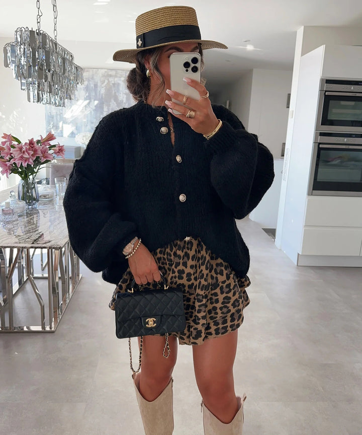 Kvinnors trendiga cardigan med oversized ärmar och knapprad Mirla-Eva Jonsson