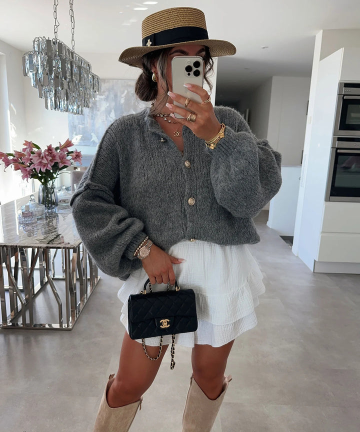 Kvinnors trendiga cardigan med oversized ärmar och knapprad Mirla-Eva Jonsson