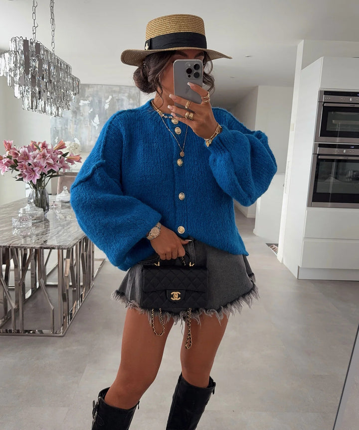 Kvinnors trendiga cardigan med oversized ärmar och knapprad Mirla-Eva Jonsson