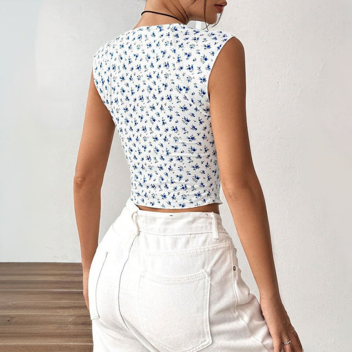 Kvinnors trendiga crop top med blommönster och rynkdetaljer Mirla-Eva Jonsson