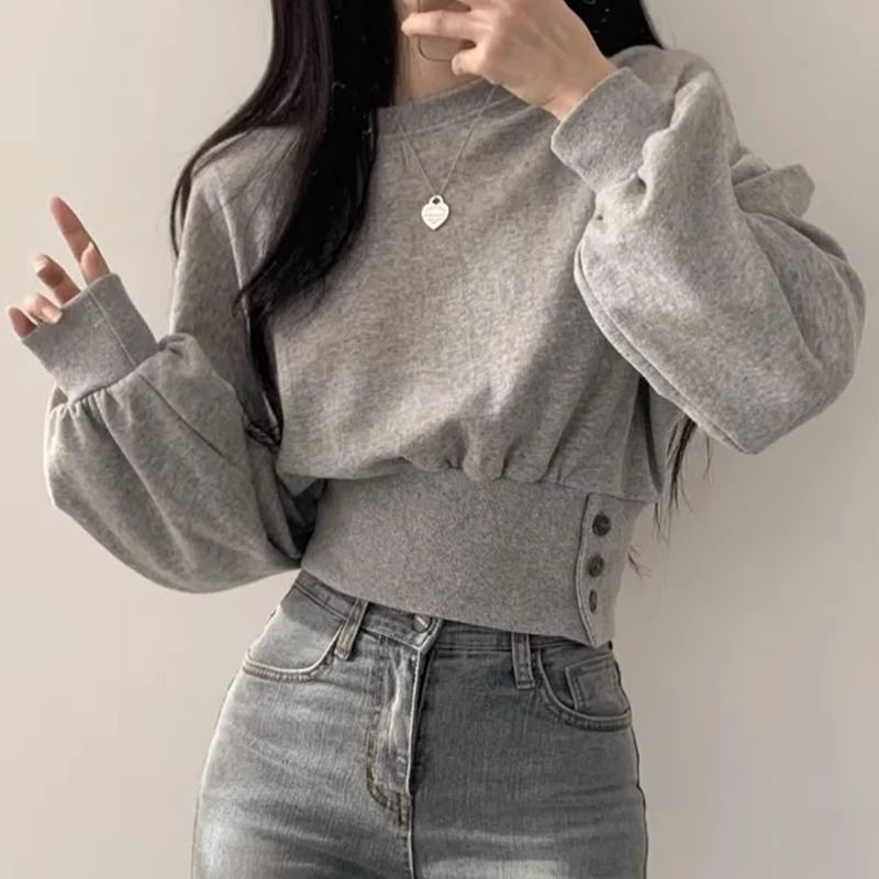 Kvinnors trendiga cropped sweatshirt med puffärmar Mirla-Eva Jonsson