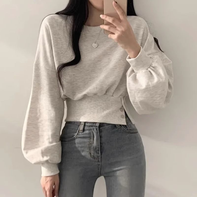 Kvinnors trendiga cropped sweatshirt med puffärmar Mirla-Eva Jonsson