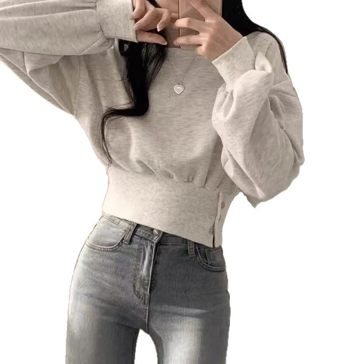 Kvinnors trendiga cropped sweatshirt med puffärmar Mirla-Eva Jonsson